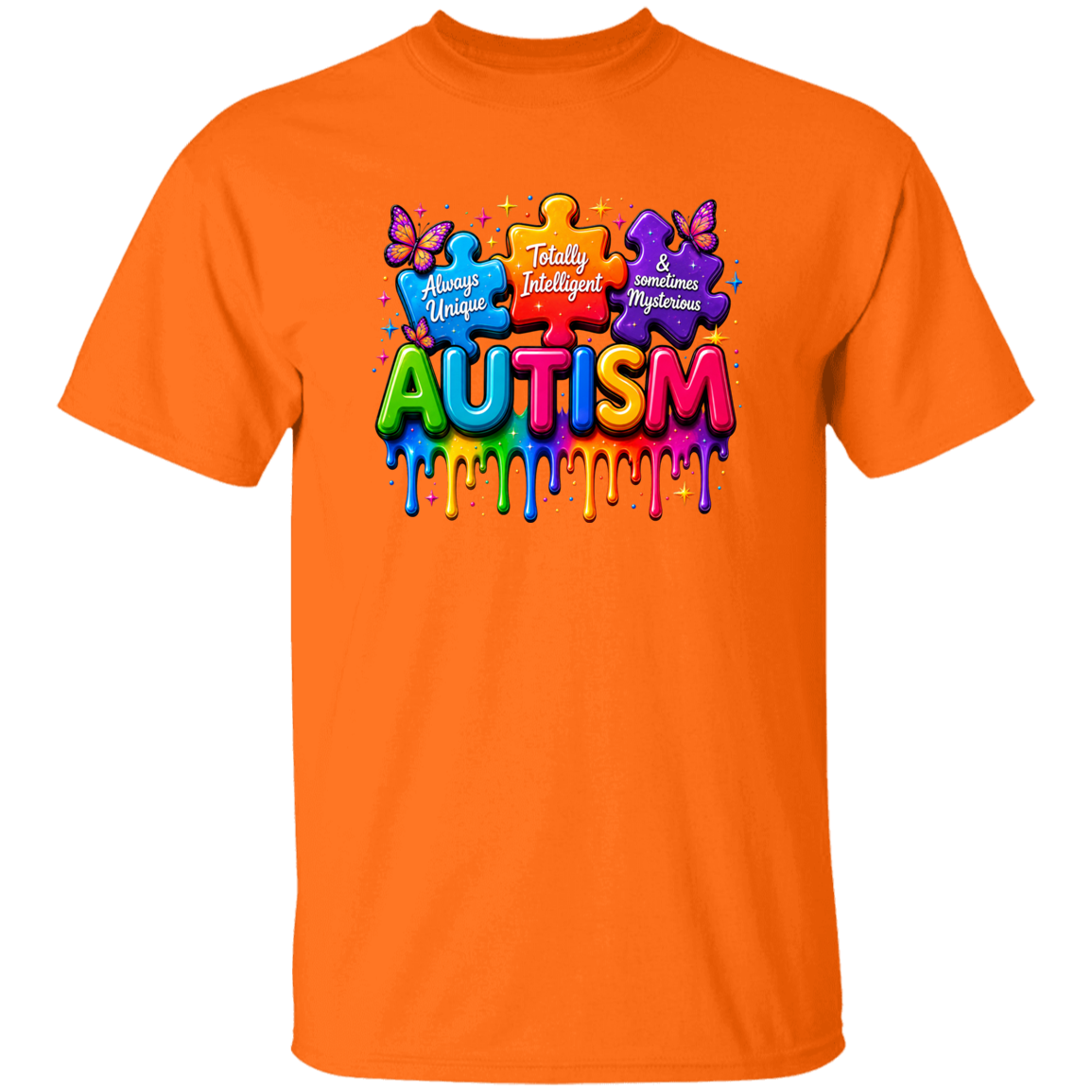 An orange short-sleeve crewneck t-shirt featuring a colorful graphic on the chest with puzzle pieces, butterflies, and the word 'AUTISM' in dripping rainbow letters.