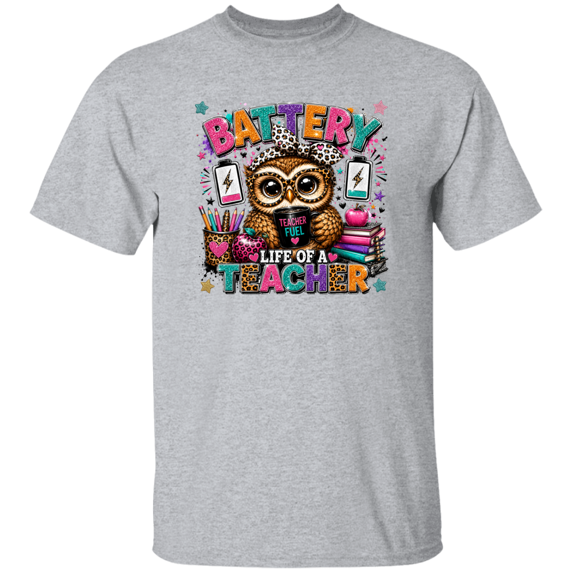 A heather gray short-sleeve crewneck t-shirt featuring a colorful graphic print of an owl wearing glasses, surrounded by school supplies and the text 'BATTERY LIFE OF A TEACHER'.
