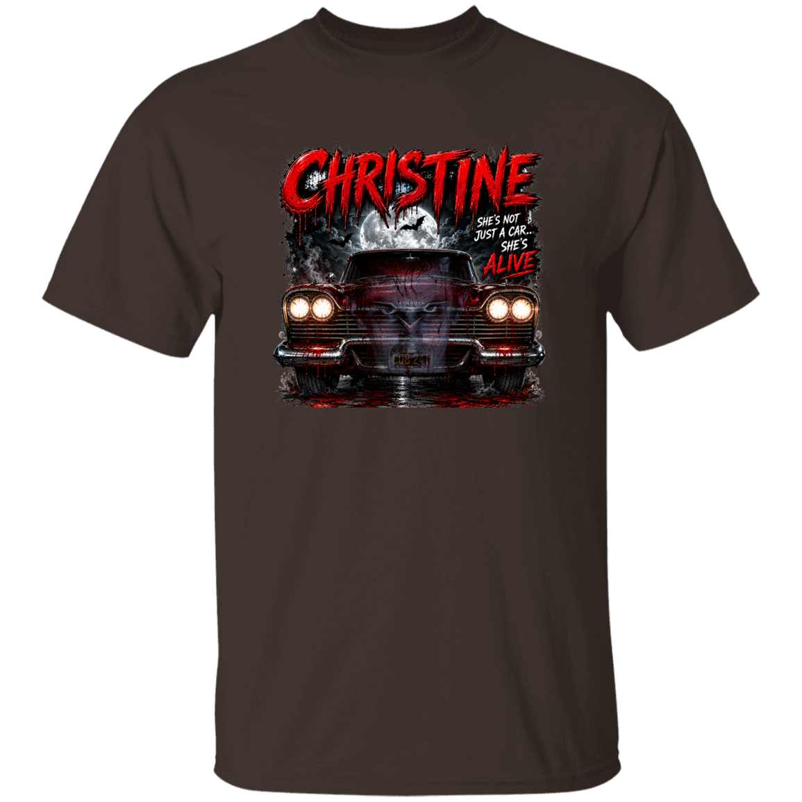 A dark brown short-sleeve crewneck t-shirt featuring a graphic print of a red classic car with the text 'CHRISTINE SHES NOT JUST A CAR SHES ALIVE' in red and white.