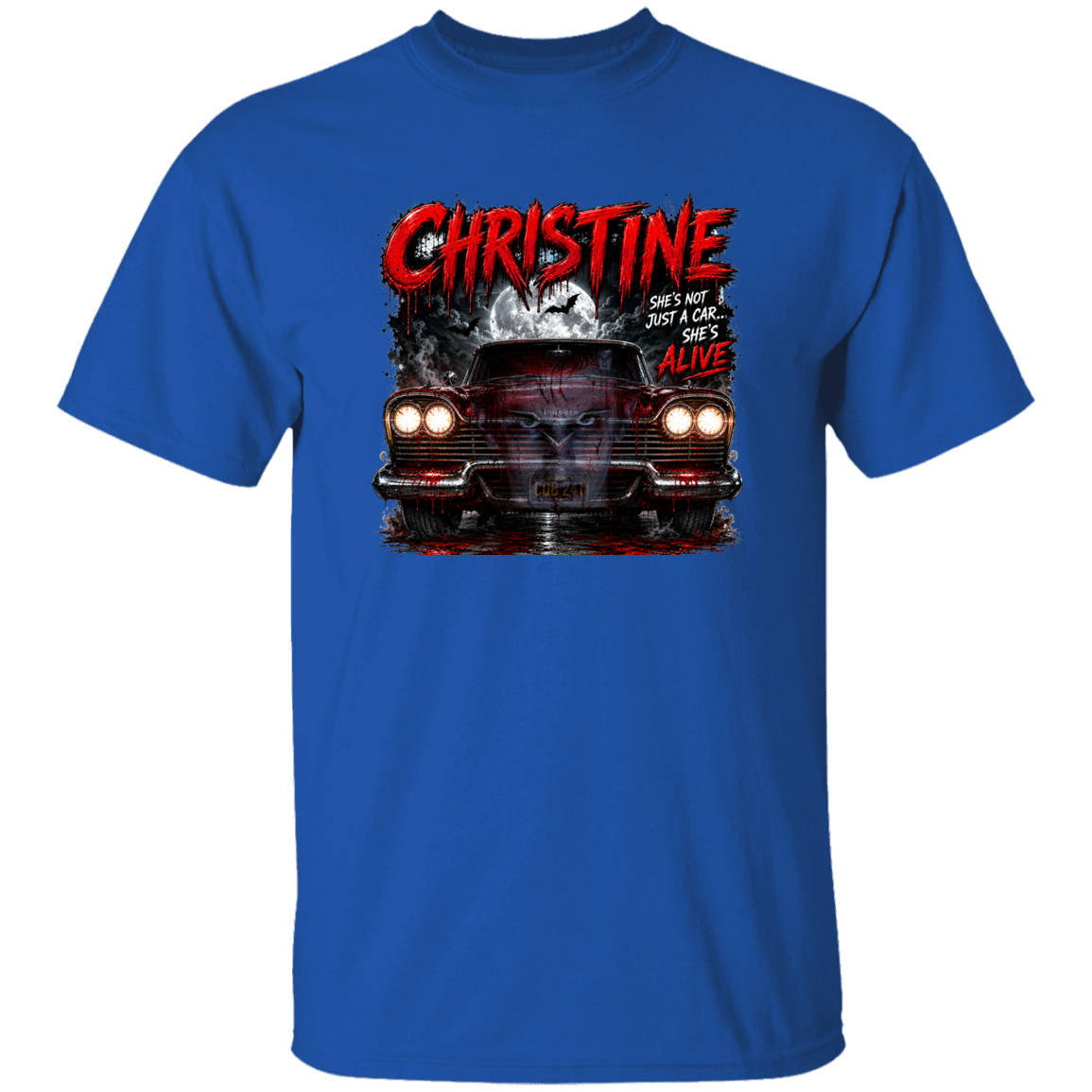 A royal blue short-sleeve t-shirt with a large graphic print on the front. The graphic features a red classic car, a dark figure, and distressed red and white text reading 'CHRISTINE' and 'SHES NOT JUST A CAR SHES ALIVE'.