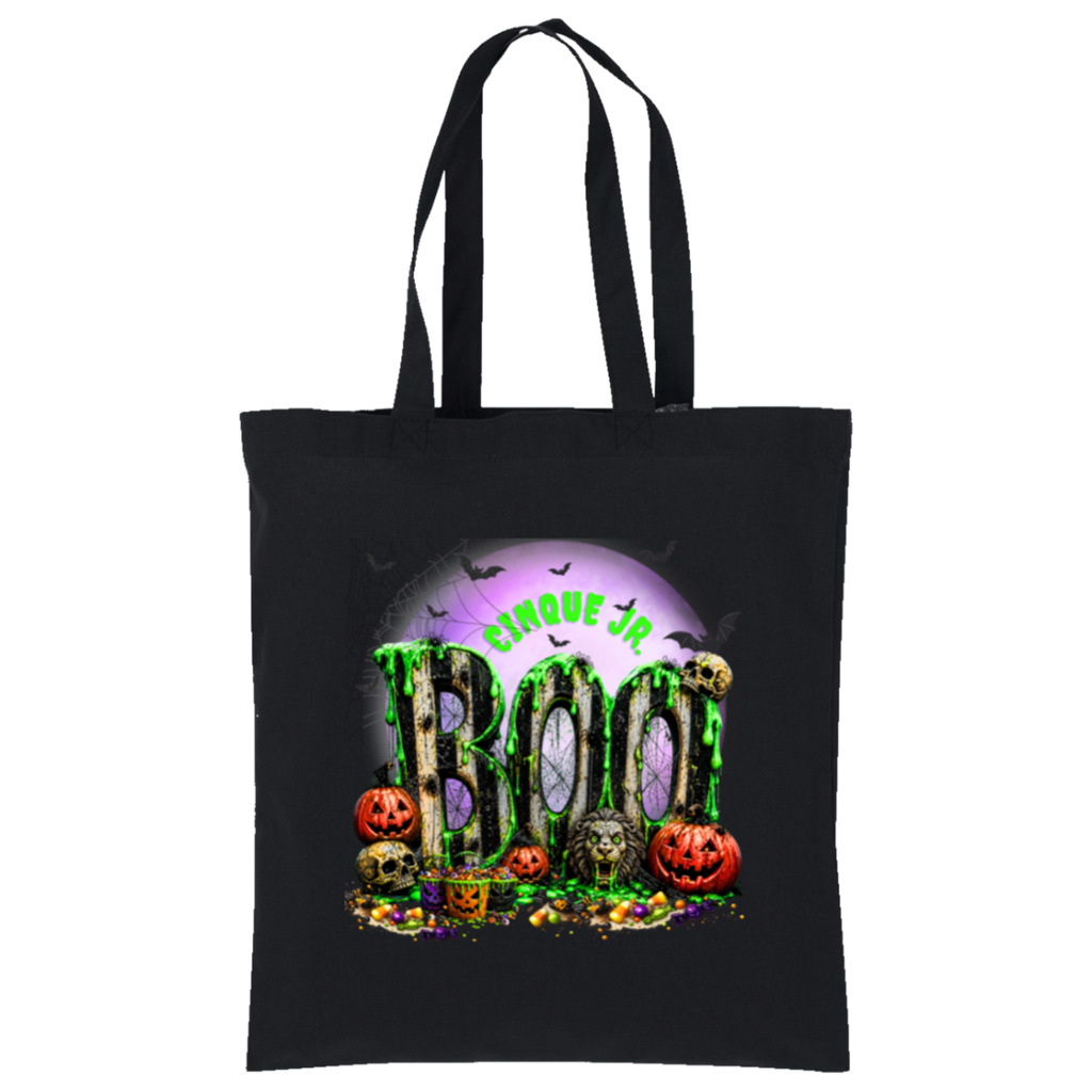A black canvas tote bag with two shoulder straps, featuring a colorful Halloween graphic on the front. The graphic displays the words 'CINQUE JR' in green above the word 'BOO' in dripping green slime, surrounded by jack-o'-lanterns, skulls, candy, and a purple full moon with bats.