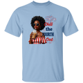 a light blue t-shirt with a graphic of a woman celebrating the Fourth of July.