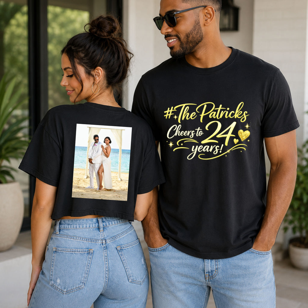 Couple wearing black t-shirts with celebratory text and a photo of a couple on a beach.
