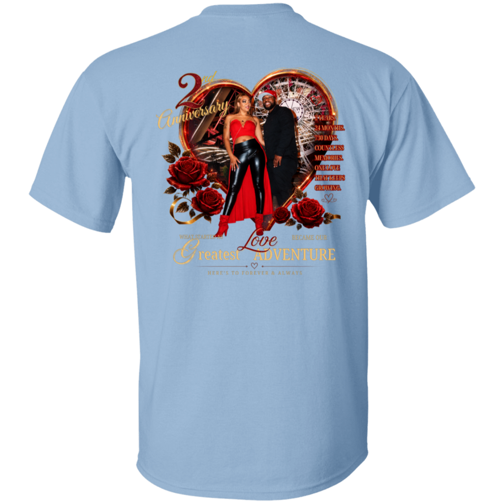 A light blue short-sleeve t-shirt shown from the back, featuring a large graphic print with a heart, roses, a couple, and romantic text including '2nd Anniversary' and 'Together in Love Adventure'.