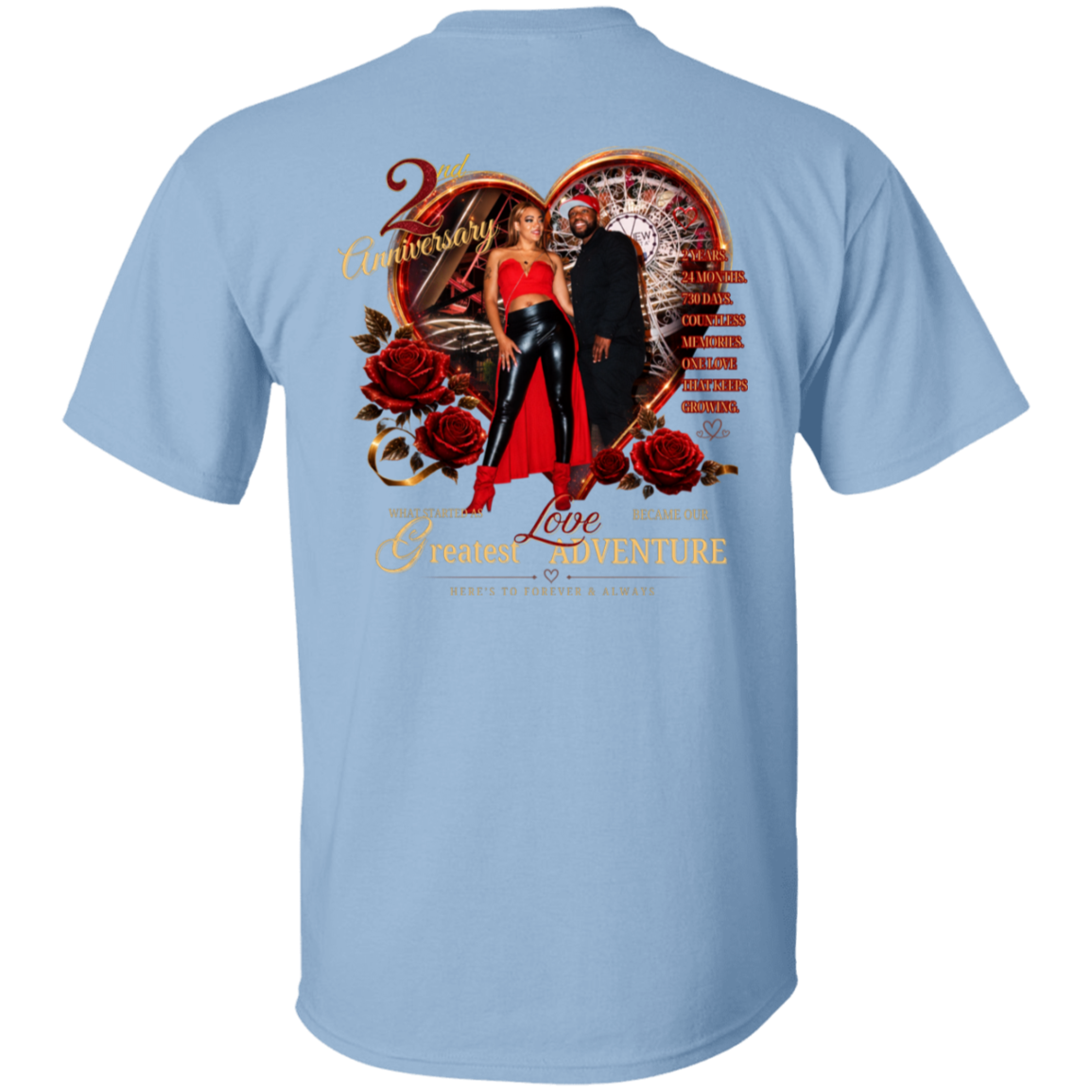 A light blue short-sleeve t-shirt shown from the back, featuring a large graphic print with a heart, roses, a couple, and romantic text including '2nd Anniversary' and 'Together in Love Adventure'.