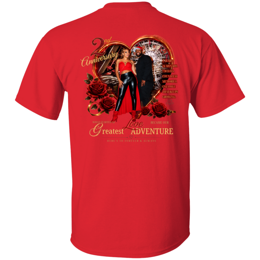 A red short-sleeve t-shirt shown from the back, featuring a large graphic print with a heart, roses, a couple, and gold text reading '2nd Anniversary' and 'Greatest Love Adventure'.