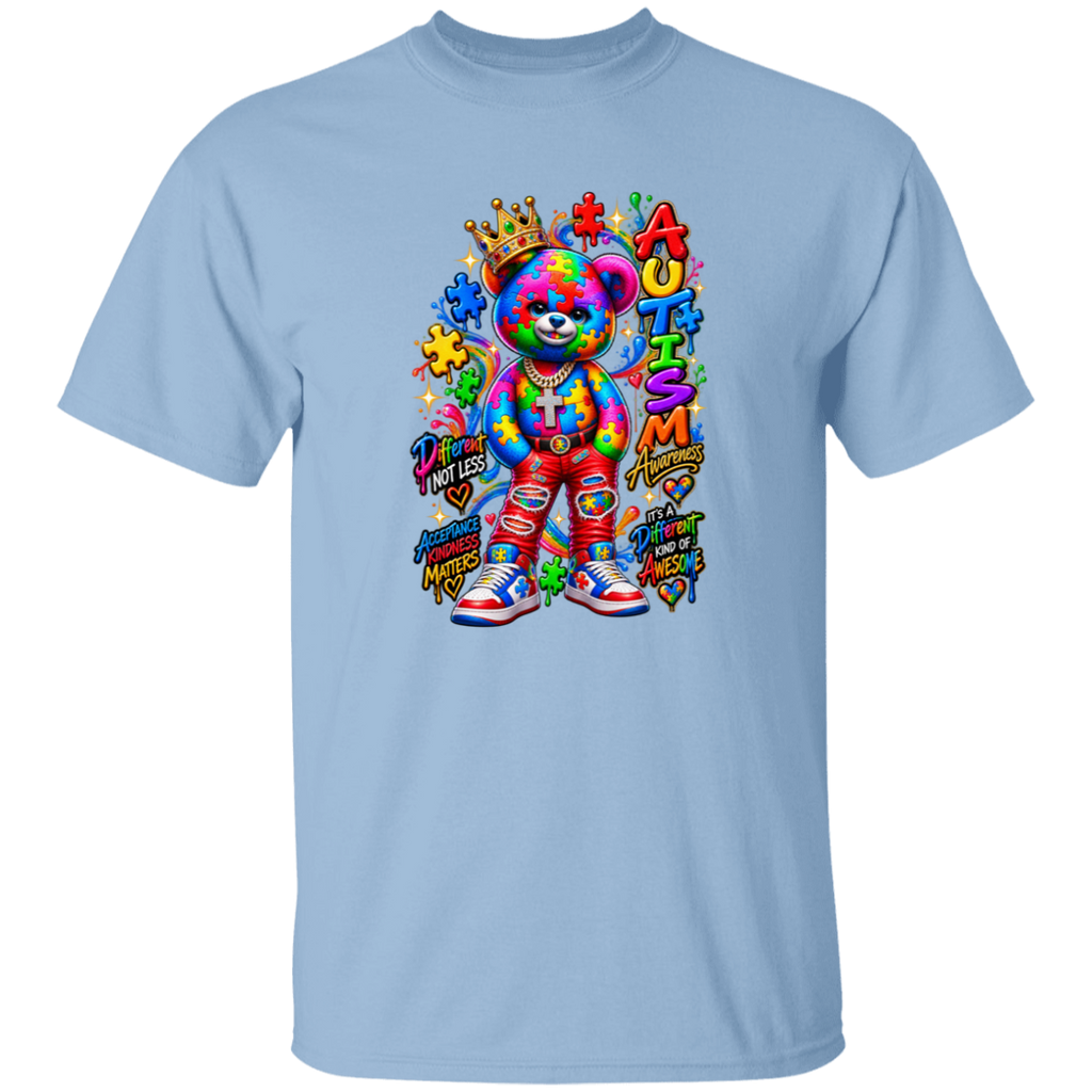 A LIGHT BLUE graphic t-shirt featuring a colorful autism awareness teddy bear design with the text 'Praise Not Less Autism Awareness It's a DIFFERENT kind of awesome'.