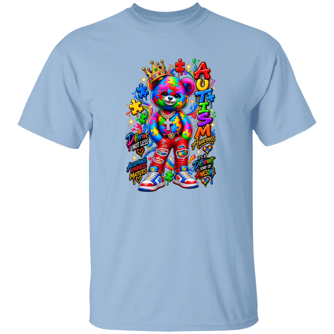 A LIGHT BLUE graphic t-shirt featuring a colorful autism awareness teddy bear design with the text 'Praise Not Less Autism Awareness It's a DIFFERENT kind of awesome'.