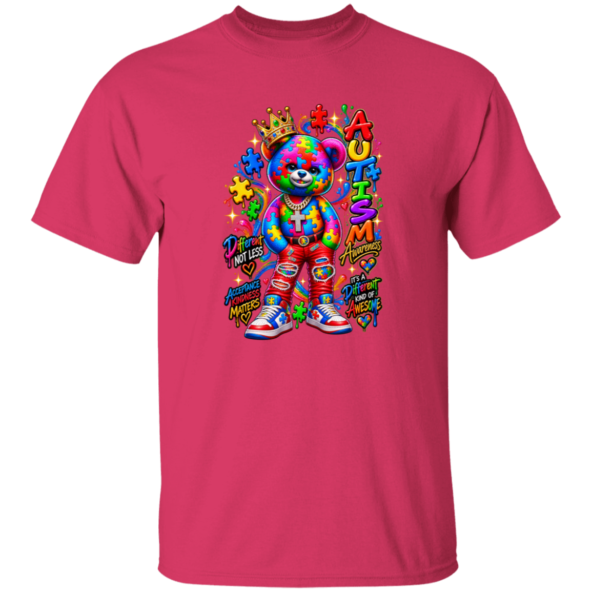 A bright pink short-sleeve crewneck t-shirt featuring a colorful graphic of a teddy bear with a rainbow tie-dye pattern, surrounded by puzzle pieces, stars, and text including 'AUTISM' and 'Proudly Non-Traditional'.