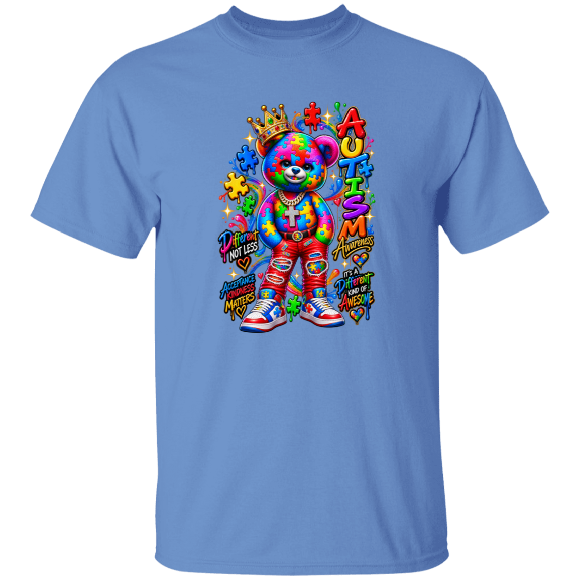 A light blue short-sleeve crewneck t-shirt featuring a vibrant, colorful graphic of a teddy bear with a rainbow tie-dye pattern, a gold crown, and graffiti-style text elements on the front.