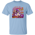 A light blue short-sleeve crewneck t-shirt featuring a colorful graphic print of a ghost wearing a purple beanie and sunglasses, surrounded by fall elements like pumpkins, books, and shopping bags, with the text 'FALL IS Expensive AND I AM WEAK'.