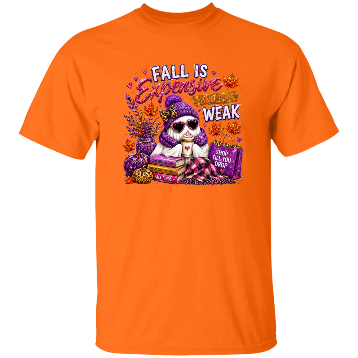 An orange short-sleeve crewneck t-shirt featuring a colorful graphic of a ghost wearing a purple knit hat and sunglasses, surrounded by fall elements and the text 'FALL IS Expensive AND I WEAK'.