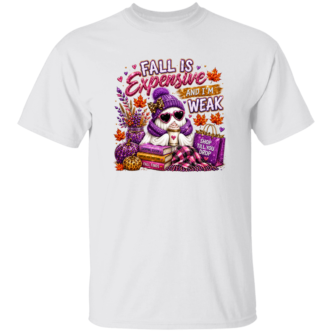 A white short-sleeve crewneck t-shirt featuring a colorful graphic print on the front. The graphic shows a cartoon ghost wearing a purple knit hat and sunglasses, surrounded by fall elements like pumpkins, autumn leaves, and shopping bags, with the text 'FALL IS Expensive AND I'M WEAK'.