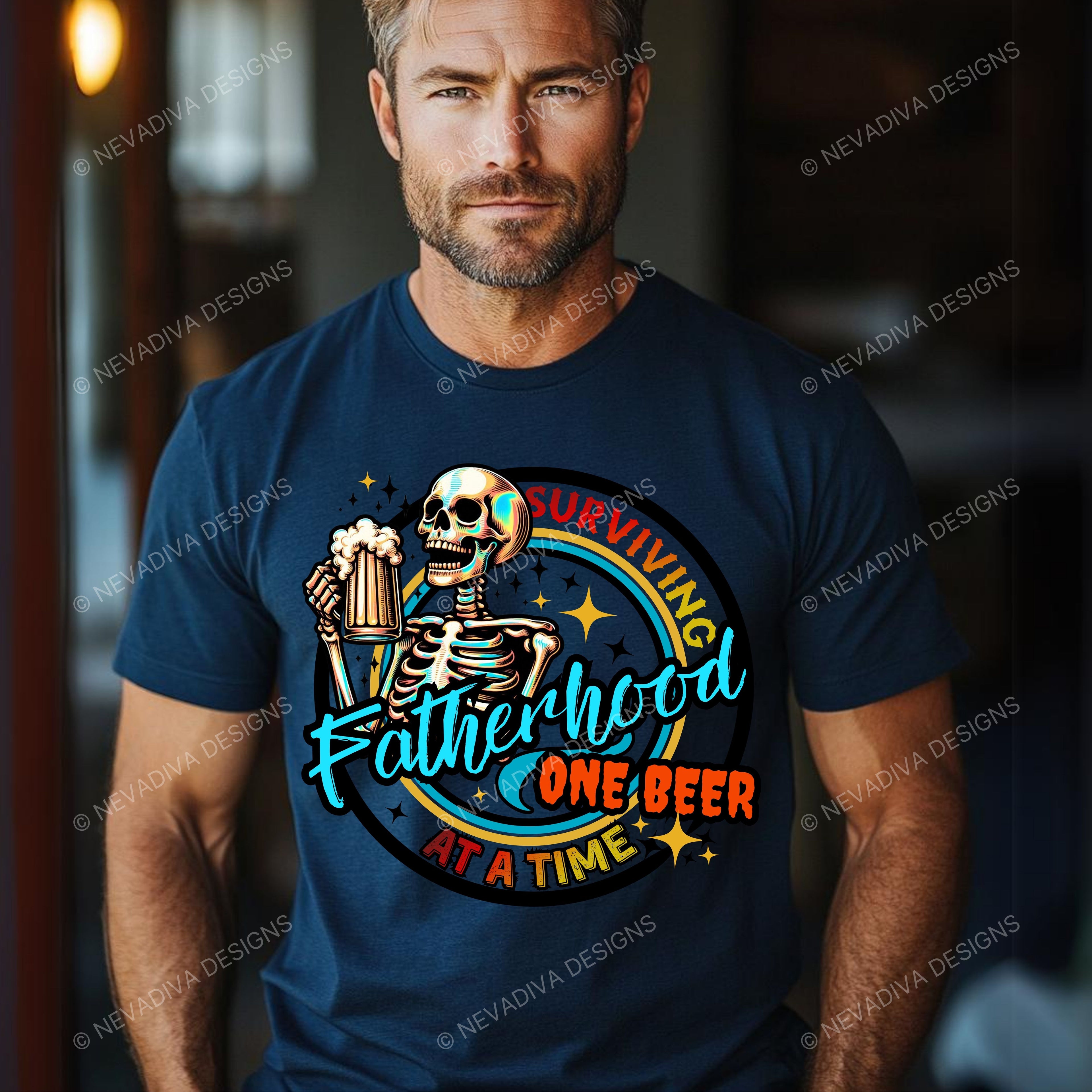 Man wearing a navy blue t-shirt with a colorful skeleton graphic and text.