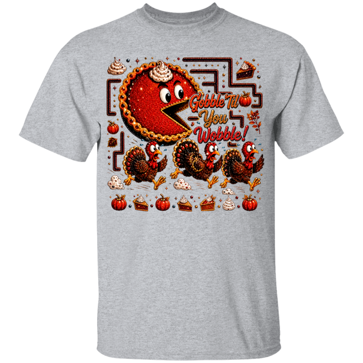 A heather gray short-sleeve crewneck t-shirt featuring a colorful Thanksgiving-themed graphic print on the front. The graphic includes a cartoon pie character with the text 'Gobble Tto You Webble!', three turkeys, pumpkins, slices of pie, and a maze.