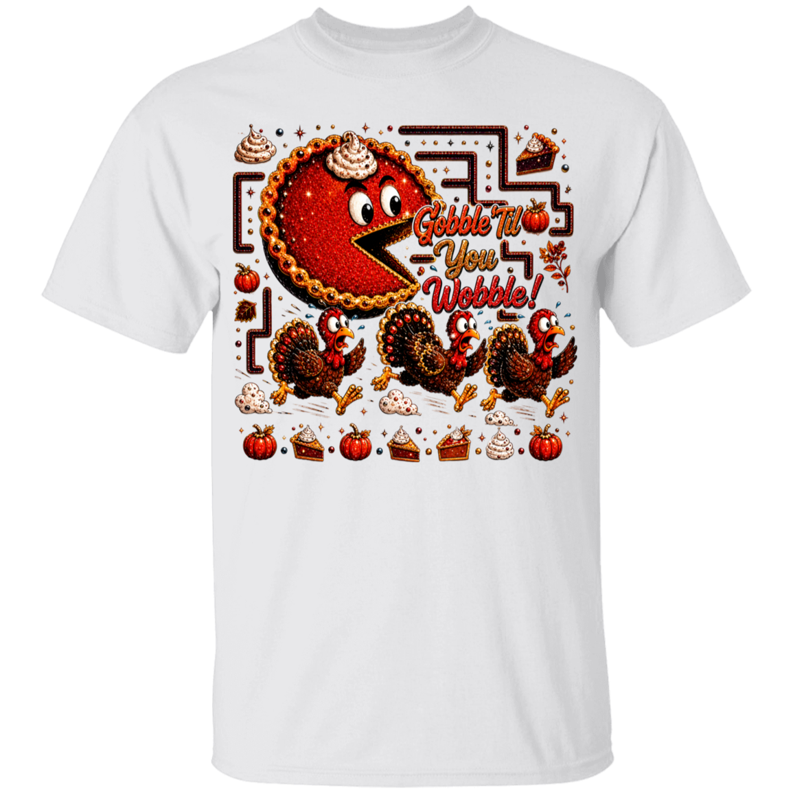 A white short-sleeve crewneck t-shirt featuring a colorful Thanksgiving-themed graphic print on the front. The graphic shows a cartoon pie eating a maze with the text 'Gobble T-You Webble!' and illustrations of turkeys, pumpkins, and pie slices.