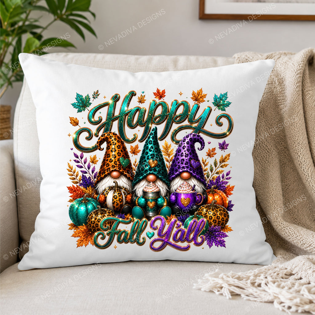 A square white throw pillow with a colorful 'Happy Fall Y'all' autumn gnome design, styled on a beige couch with a knit blanket and a plant in the background.
