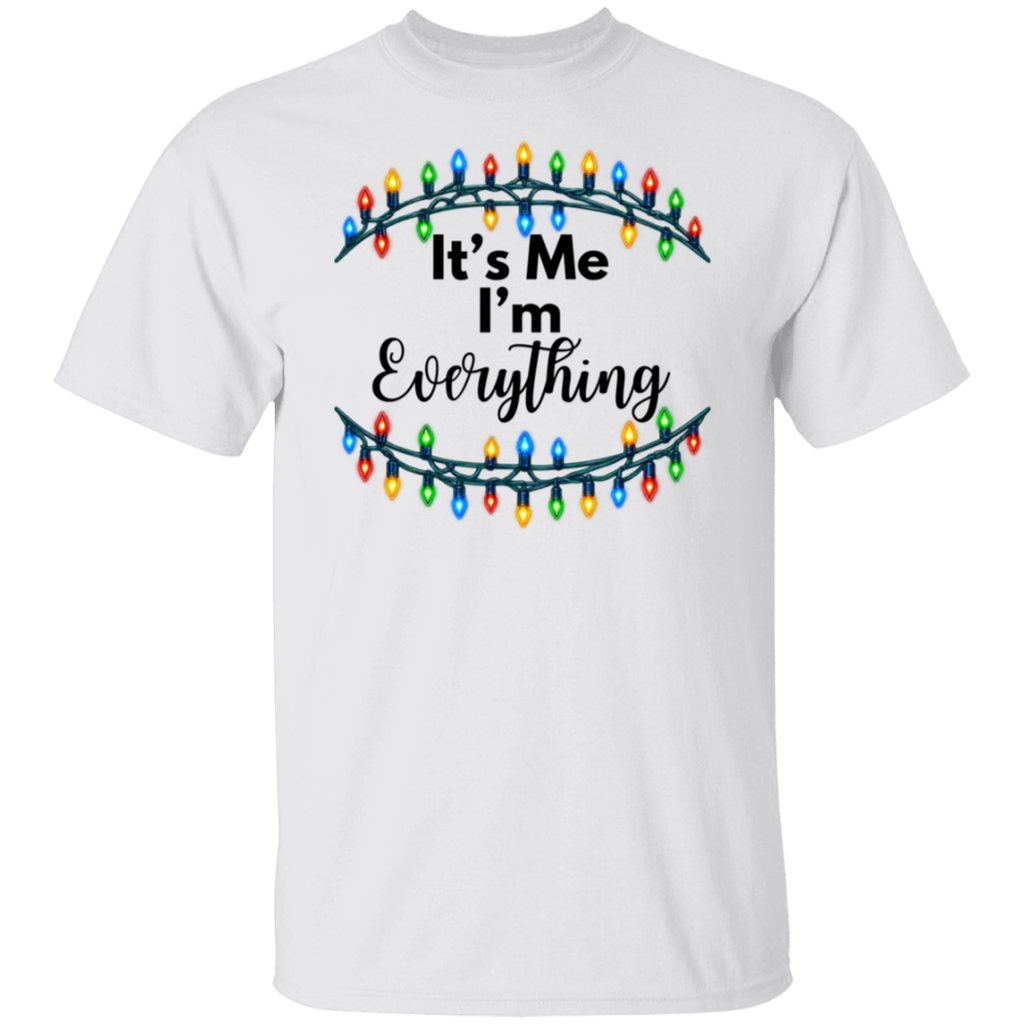 A white short-sleeve crewneck t-shirt featuring a graphic design of Christmas string lights framing the text 'It's Me I'm Everything' in black lettering.