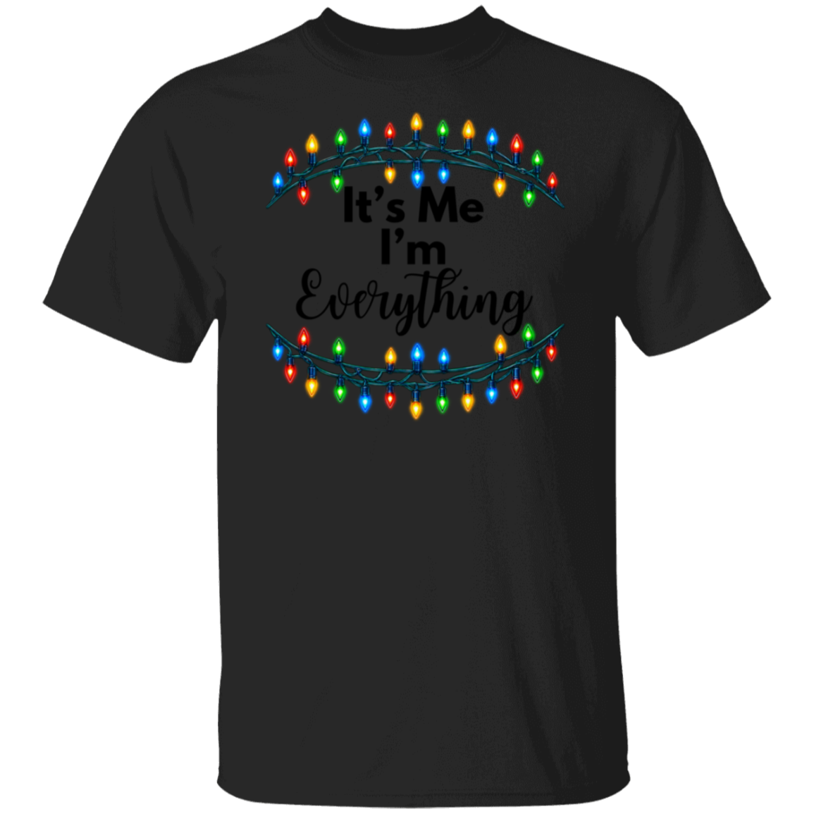 A black short-sleeve crewneck t-shirt featuring a graphic print of colorful Christmas string lights framing the text 'It's Me I'm Everything' in black lettering, shown against a plain white background.