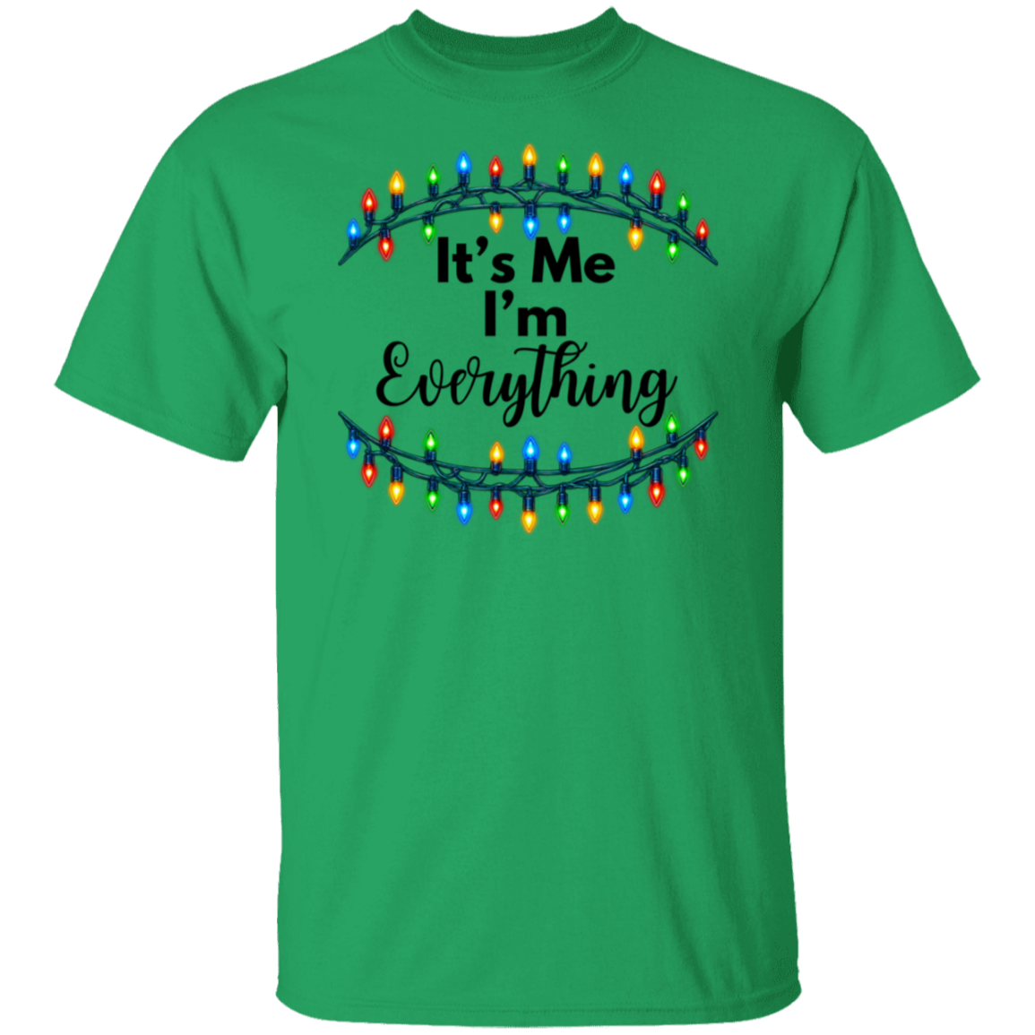 A green short-sleeve crewneck t-shirt featuring a graphic print of two Christmas light garlands with the text 'It's Me I'm Everything' in black script and block lettering.