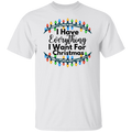 A white short-sleeve crewneck t-shirt featuring a graphic print of colorful Christmas string lights with the text 'I Have Everything I Want For Christmas' in black lettering.