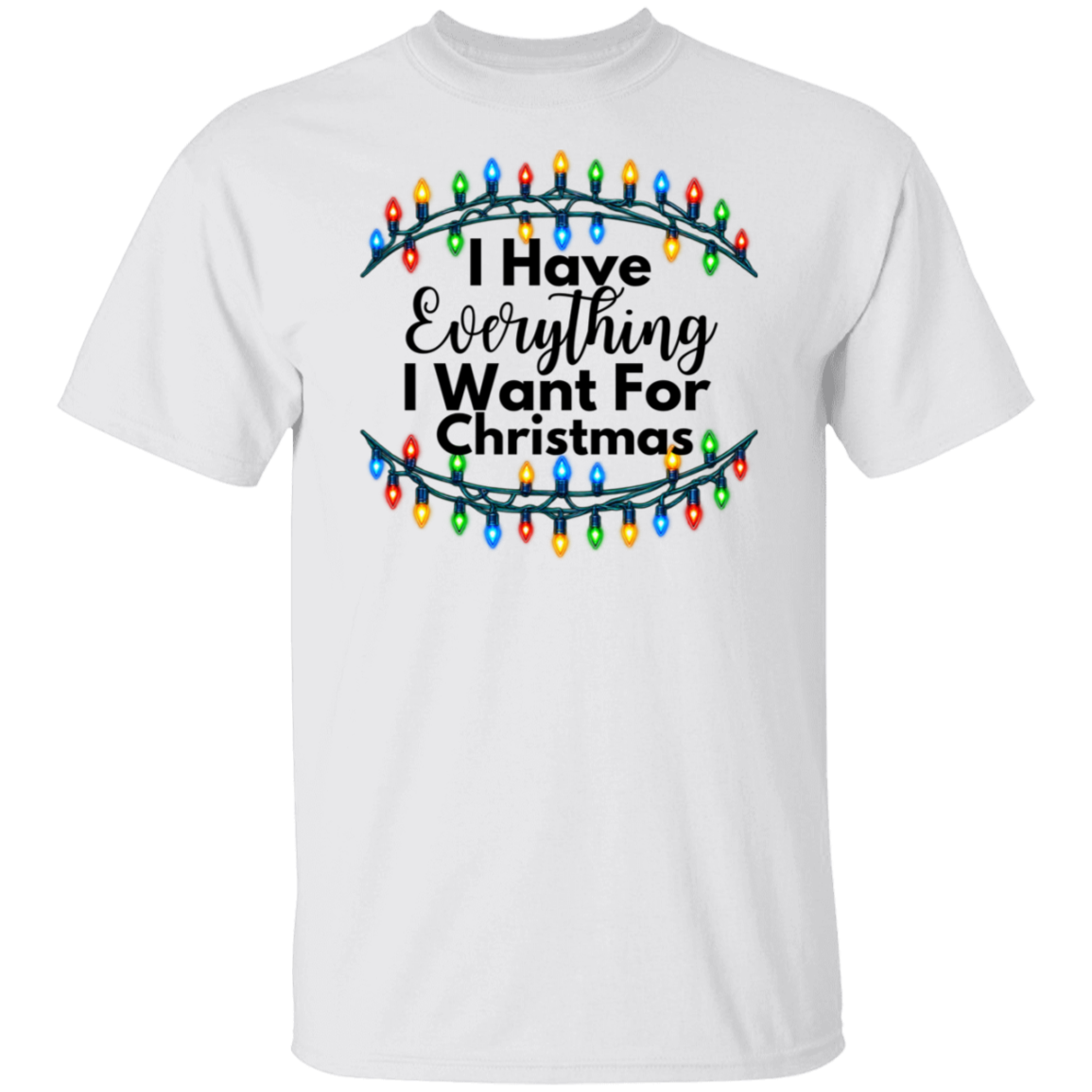 A white short-sleeve crewneck t-shirt featuring a graphic print of colorful Christmas string lights with the text 'I Have Everything I Want For Christmas' in black lettering.