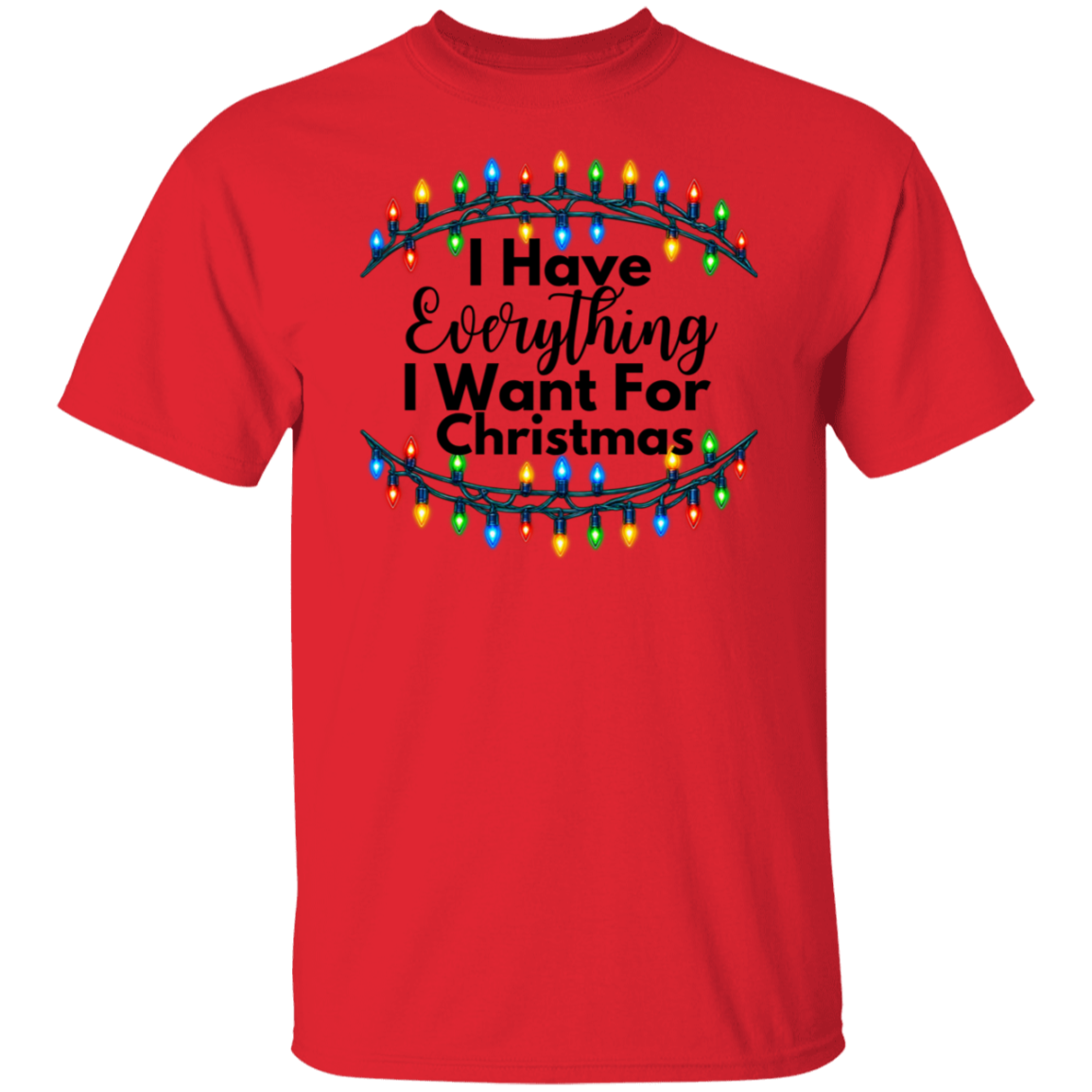 A red short-sleeve crewneck t-shirt featuring a graphic on the chest with the text 'I Have Everything I Want For Christmas' in black script, framed by a garland of colorful Christmas lights.