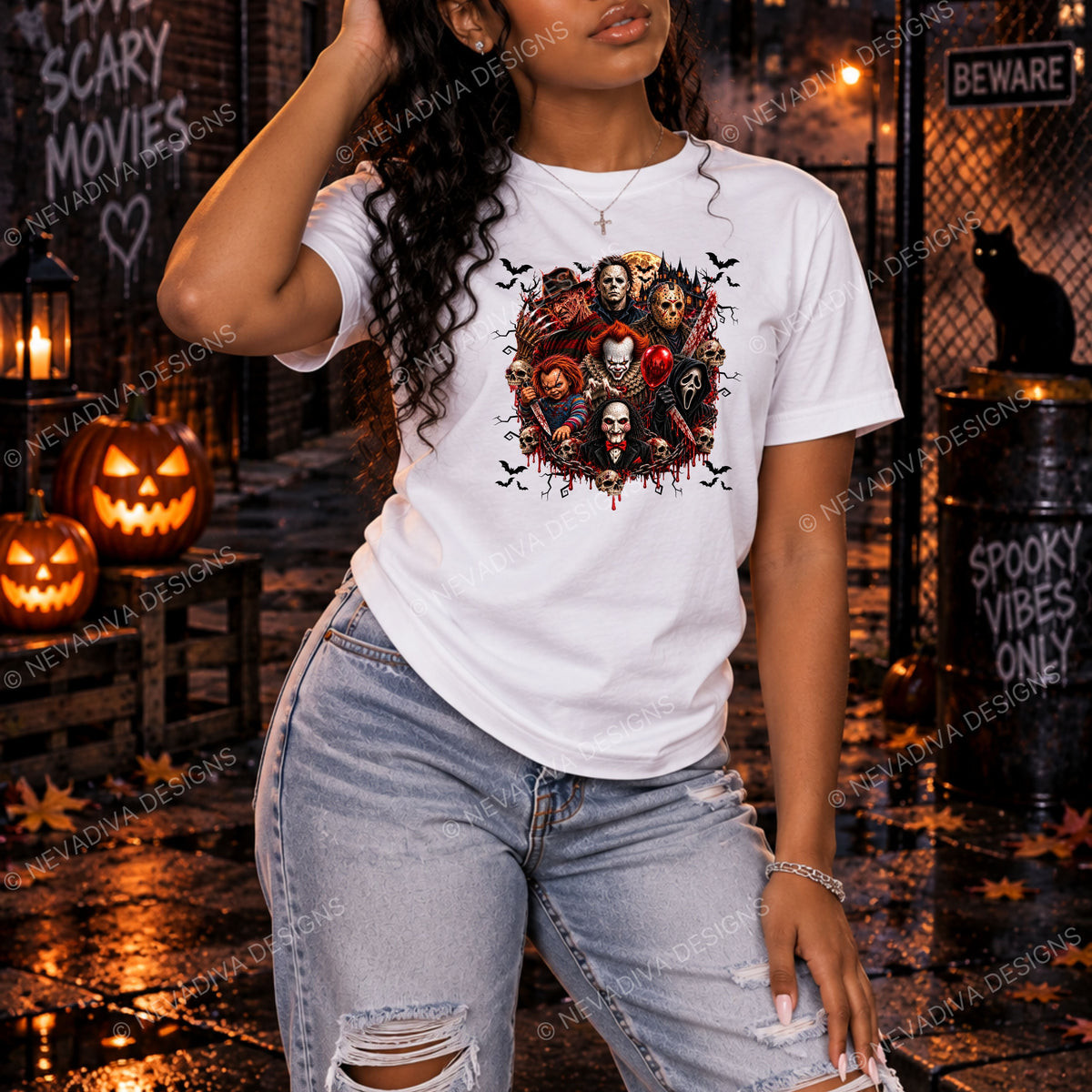 A woman wearing a white graphic t-shirt with a horror movie collage print, paired with distressed light-wash jeans, standing in a spooky Halloween-themed outdoor setting with jack-o'-lanterns and a wet street background.