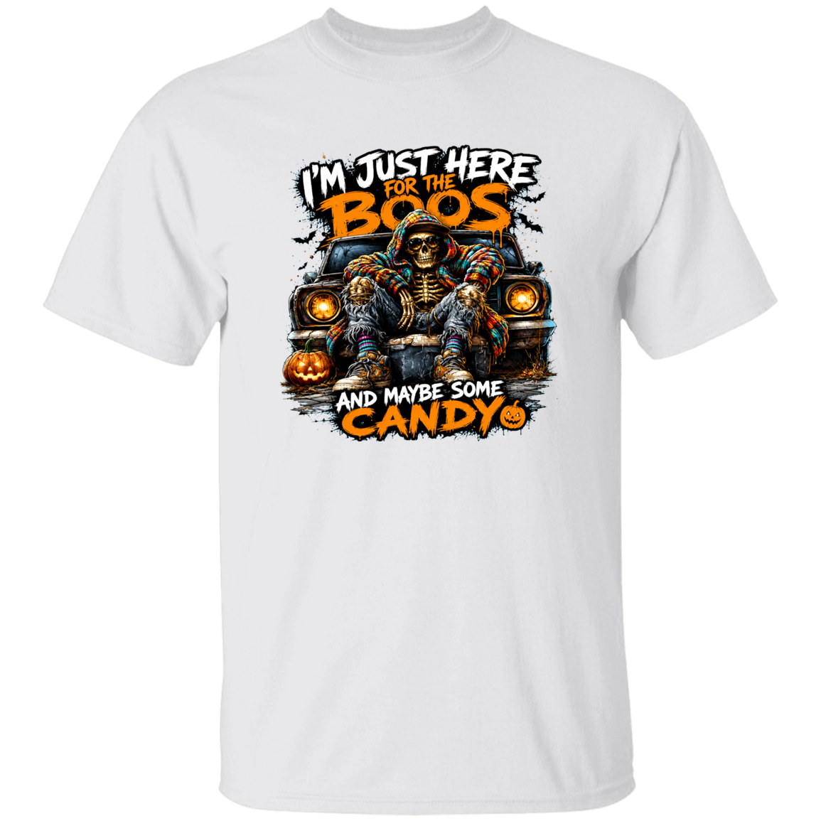 A white short-sleeve crewneck t-shirt featuring a Halloween graphic print on the front. The graphic shows a skeleton in a plaid shirt sitting in a car with jack-o'-lanterns, accompanied by the text 'I'M JUST HERE FOR THE BOOS AND MAYBE SOME CANDY'.