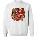A white crewneck sweatshirt featuring a large, colorful Christmas-themed graphic print on the front. The graphic depicts a Black woman in a Santa suit kissing a child, with a dog at her side, and the text 'I saw Mommy kissing Santa Clause' in stylized red and black lettering.