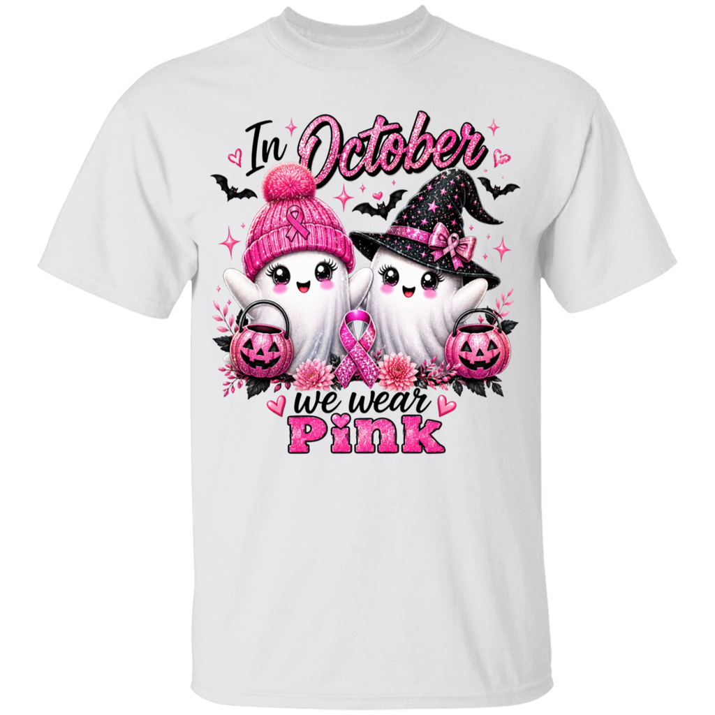 White t-shirt with Halloween-themed design featuring ghosts, pumpkins, and pink ribbons with text 'In October we wear Pink'.
