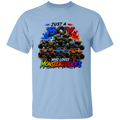 A light blue short-sleeve crewneck t-shirt featuring a colorful graphic print of monster trucks with the text 'JUST A BOY WHO LOVES MONSTER TRUCKS'.