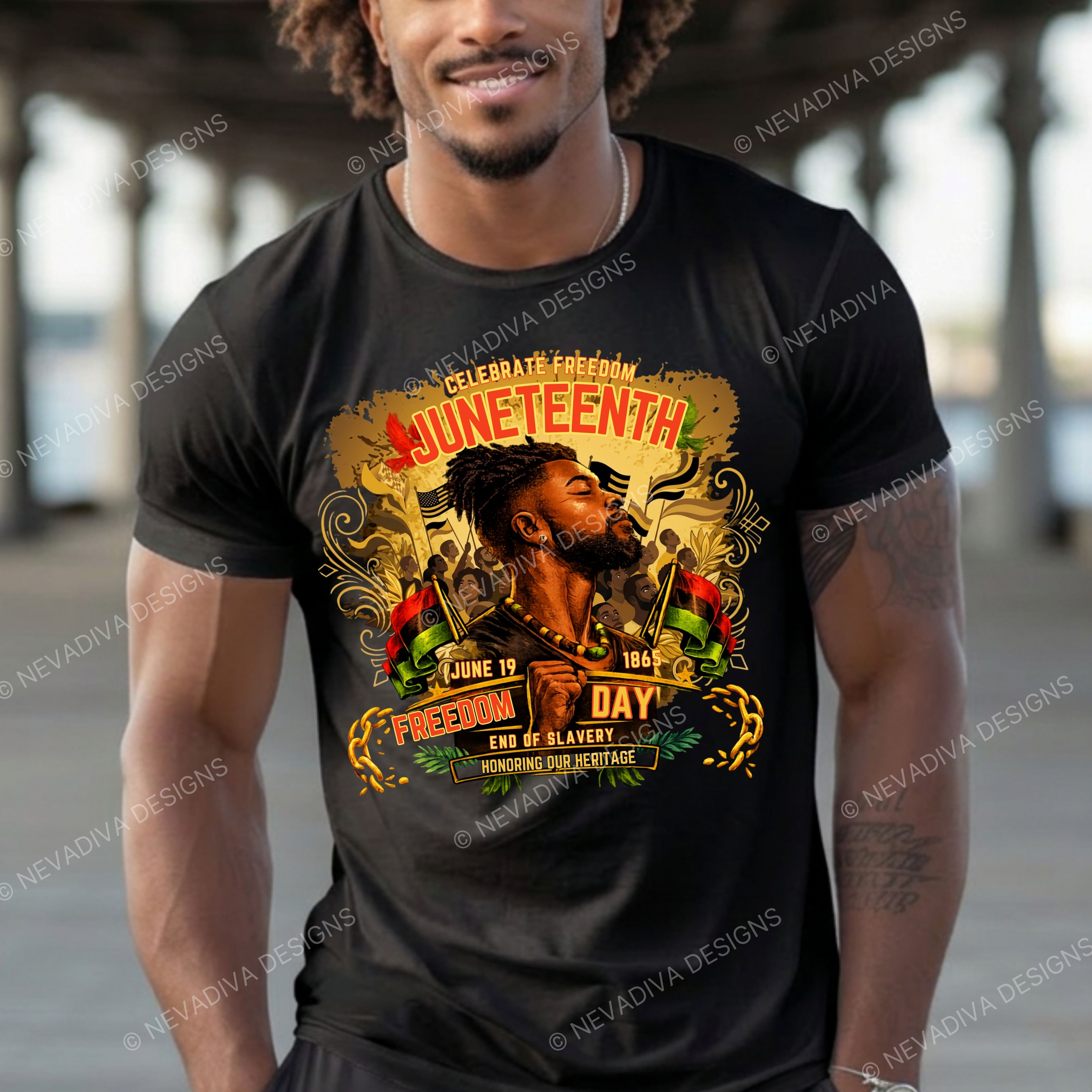 Man wearing a black t-shirt with Juneteenth graphic design outdoors.