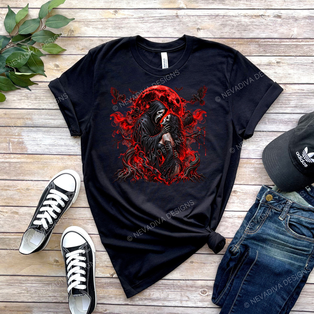 A bold gothic horror design featuring a haunting masked couple surrounded by a glowing blood-red moon, twisted trees, ravens, bats, and smoky red accents. Perfect for horror lovers, Halloween, and anyone who loves a little dark romance.
