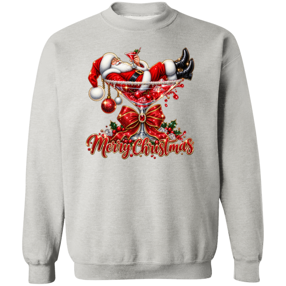 A light gray crewneck sweatshirt featuring a festive Christmas graphic on the front. The design shows Santa Claus lounging in a martini glass with red ornaments, a large red bow, holly, and the text 'Merry Christmas' in red script.