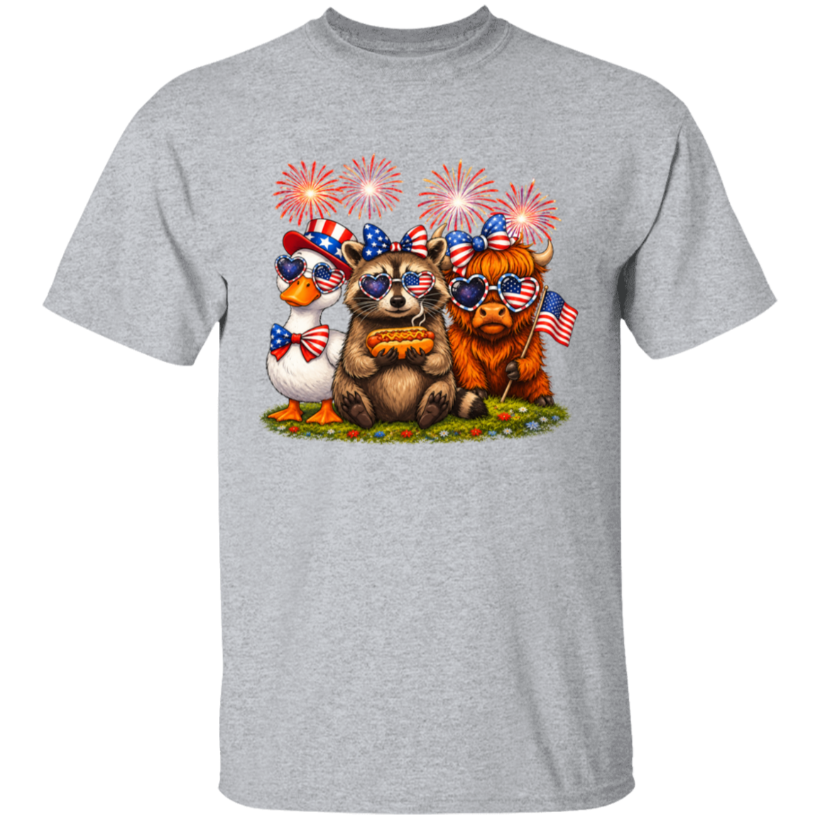 Gray t-shirt with a graphic of bears, a duck, and pumpkins with American flags and fireworks on a white background.