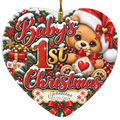 Heart-shaped Christmas ornament featuring a teddy bear wearing a Santa hat, with the text 'Baby's 1st Christmas' and a personalized name and date at the bottom. The design includes red lettering, snow, pine branches, gifts, and plaid accents on a white background.