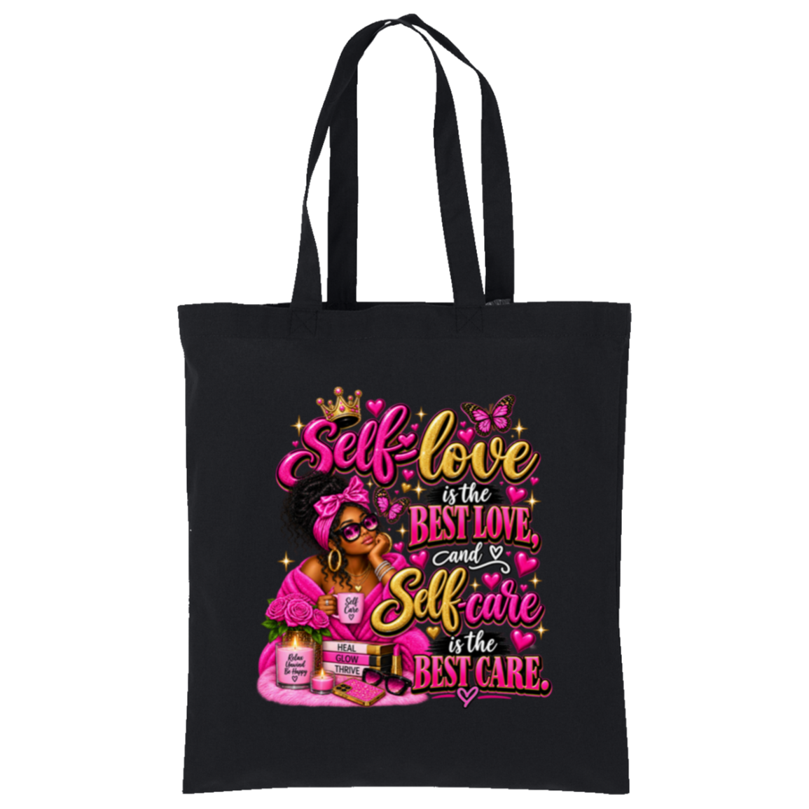 A black canvas tote bag with two black shoulder straps, featuring a colorful graphic print on the front. The graphic displays a Black woman with sunglasses, a crown, butterflies, and skincare items, surrounded by the text 'Self love is the BEST LOVE, and Self care is the BEST CARE' in pink, gold, and white lettering.