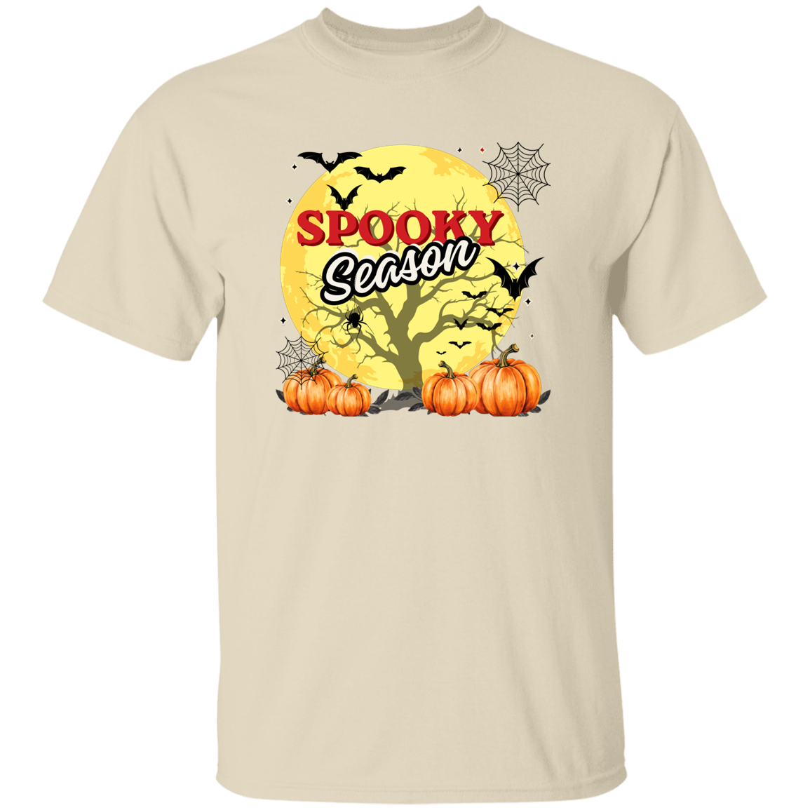 A beige crewneck t-shirt featuring a 'Spooky Season' Halloween graphic on the chest, including a yellow moon, bats, spiderwebs, pumpkins, and a tree silhouette.