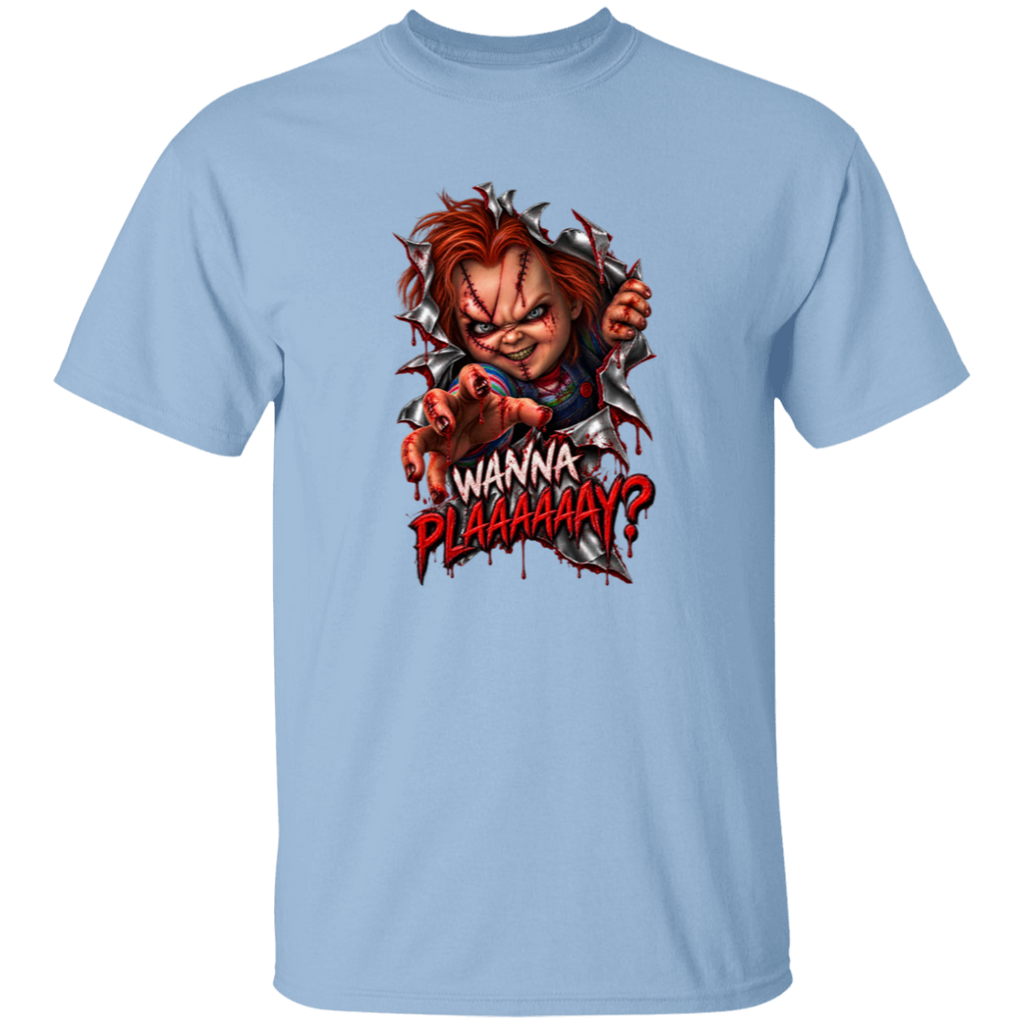 A light blue short-sleeve crewneck t-shirt featuring a graphic print of Chucky tearing through a wall with the text 'WANNA PLAAAAAAAY?' in red and white.