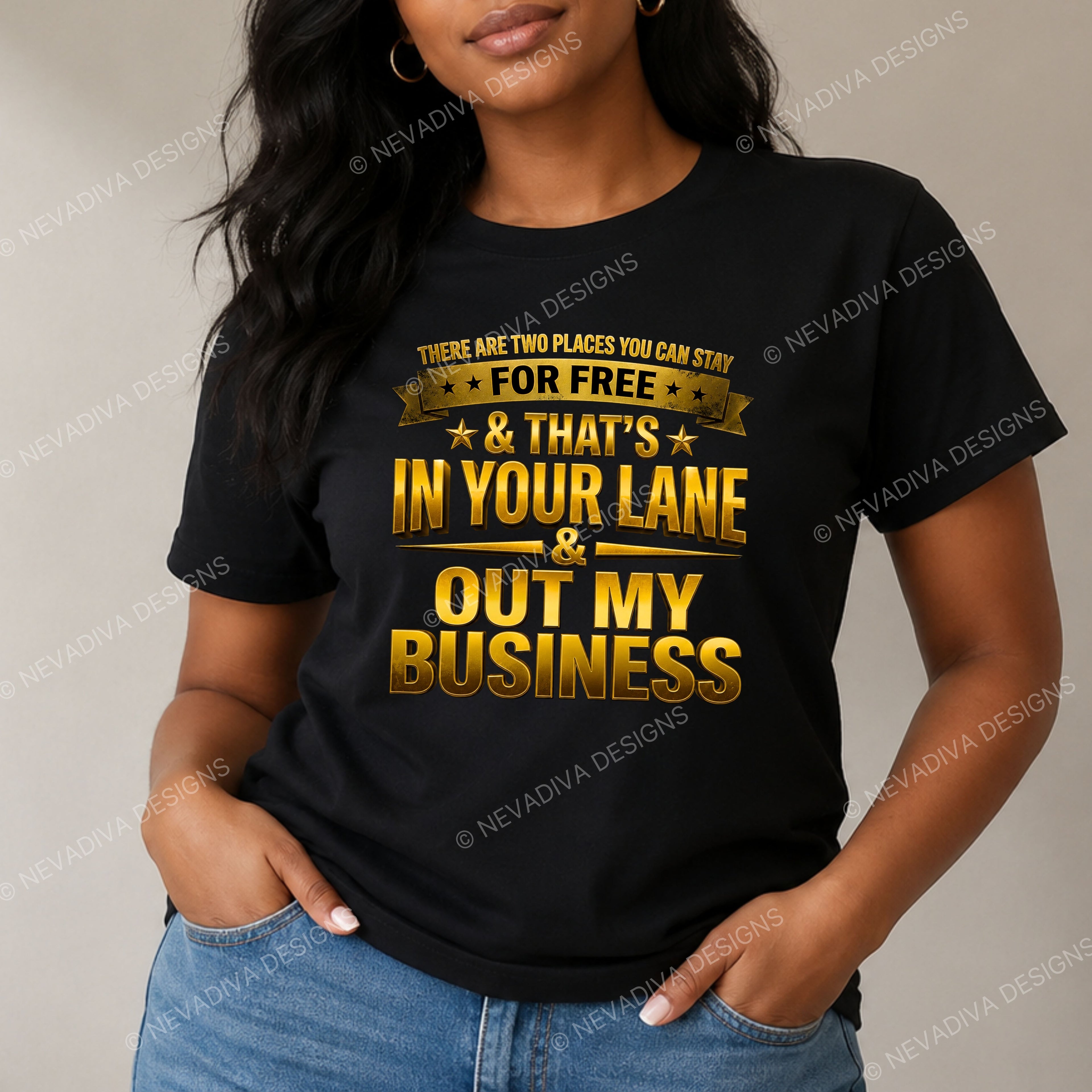 Person wearing a black t-shirt with yellow text and 'Nevadiva Designs' branding.