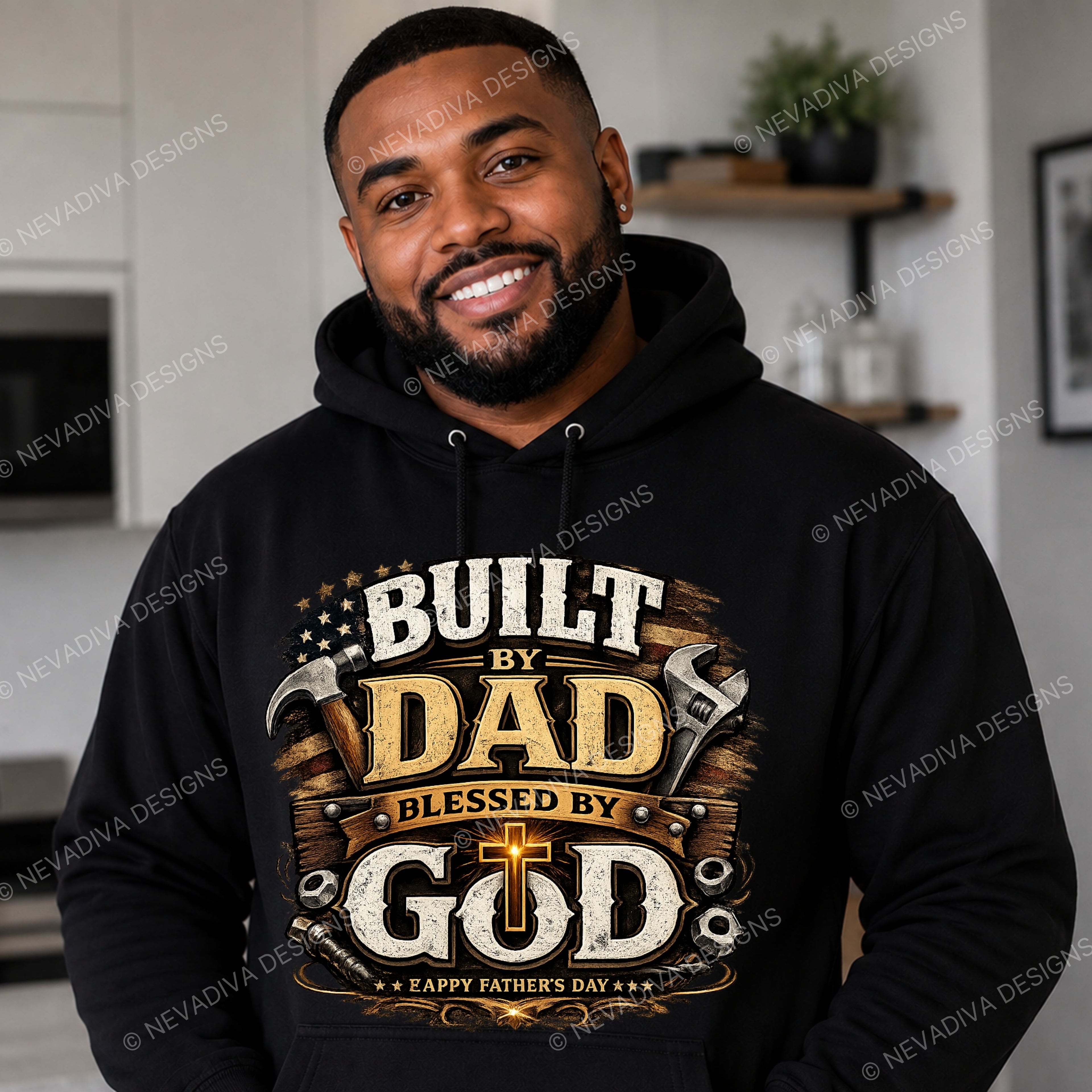 Man wearing a black hoodie with 'Built by Dad, Blessed by God' text and graphics.