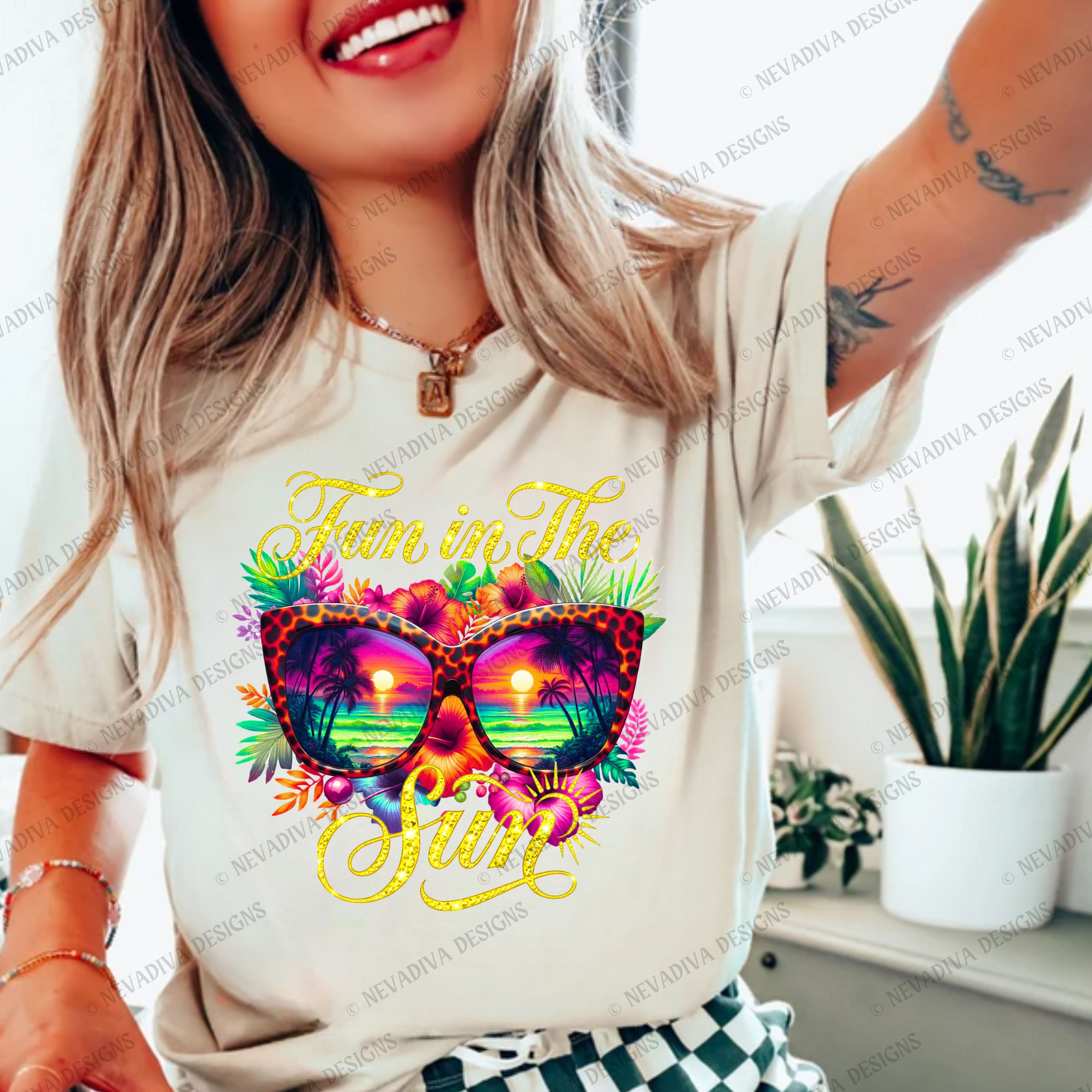 Person wearing a t-shirt with sunglasses and 'Fun in the Sun' text design.