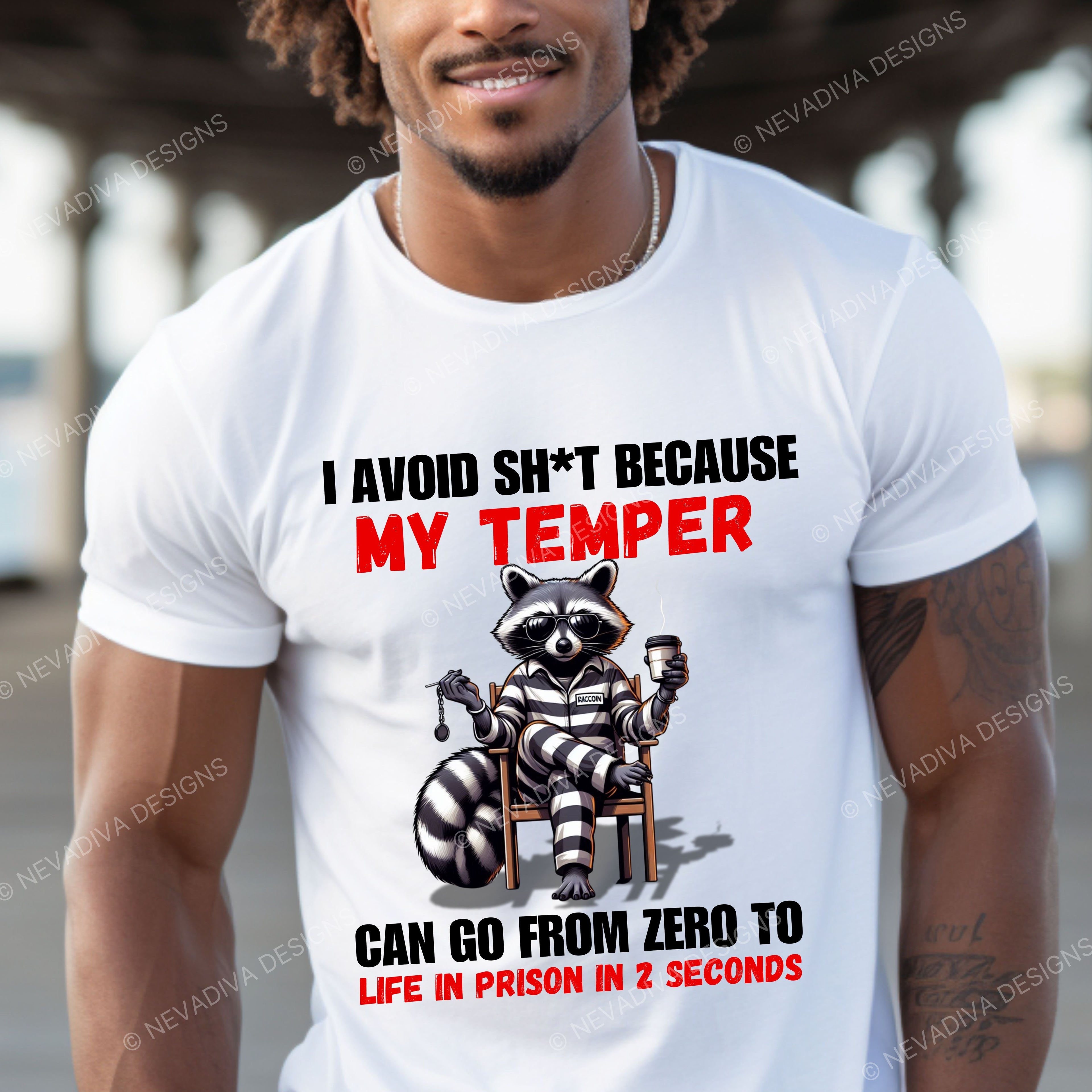 Man wearing a white t-shirt with a graphic and text, standing outdoors.